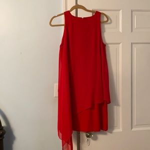 Elegant, asymmetrical red dress